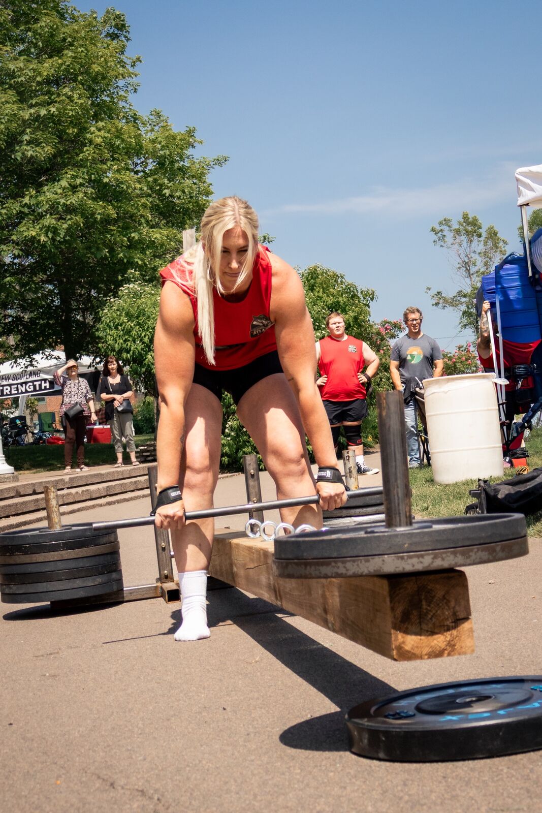New Scotland Strength client deadlifting a loaded frame at a strongman competition