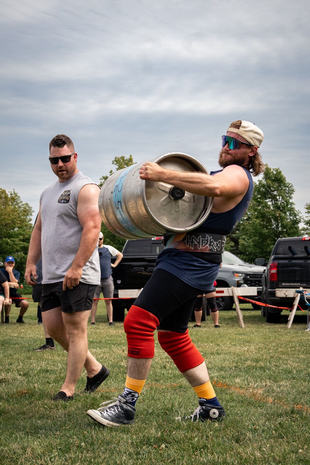 New Scotland Strength client carrying a keg at a strongman competition
