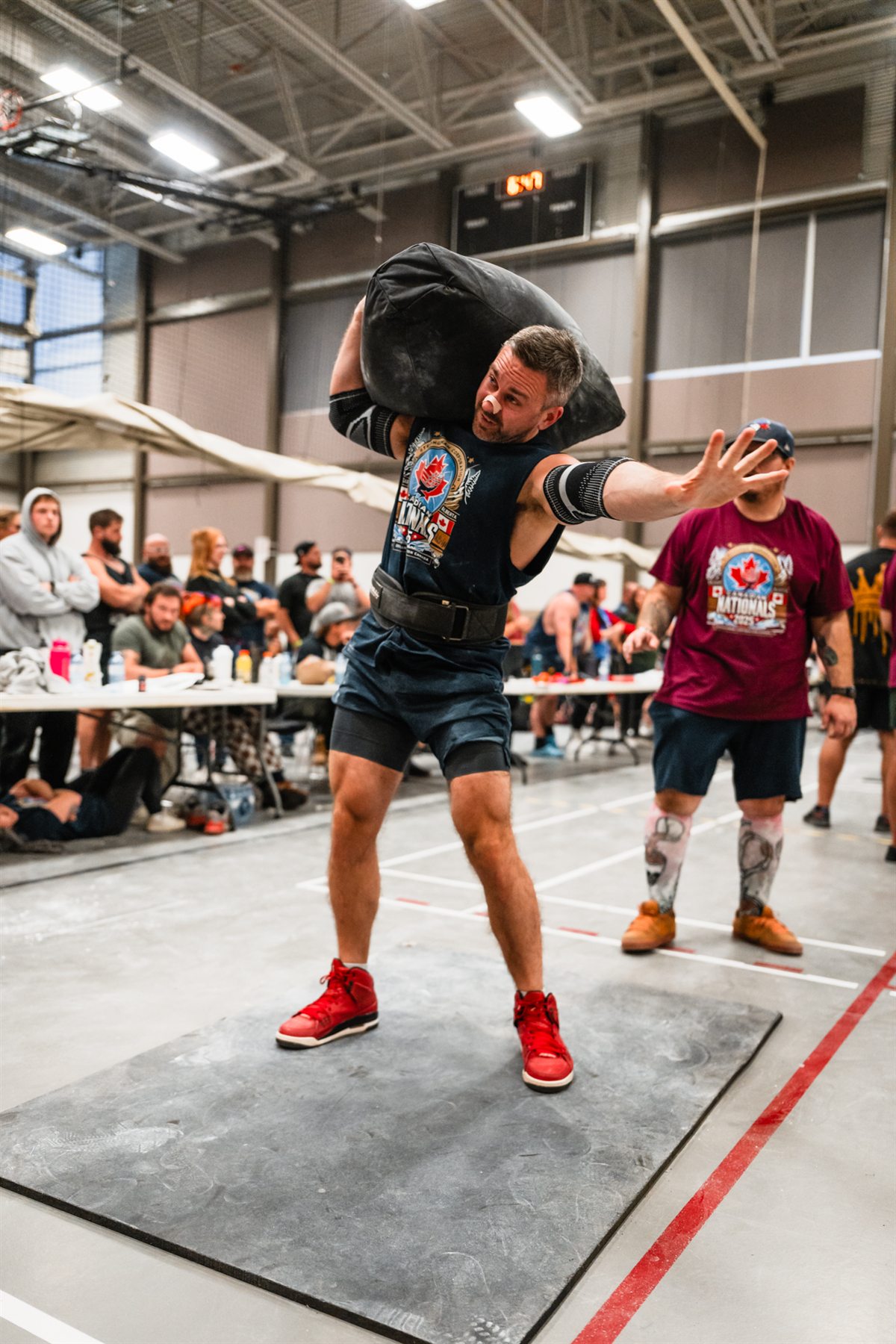 Josh Dunbar competing in a strongman event