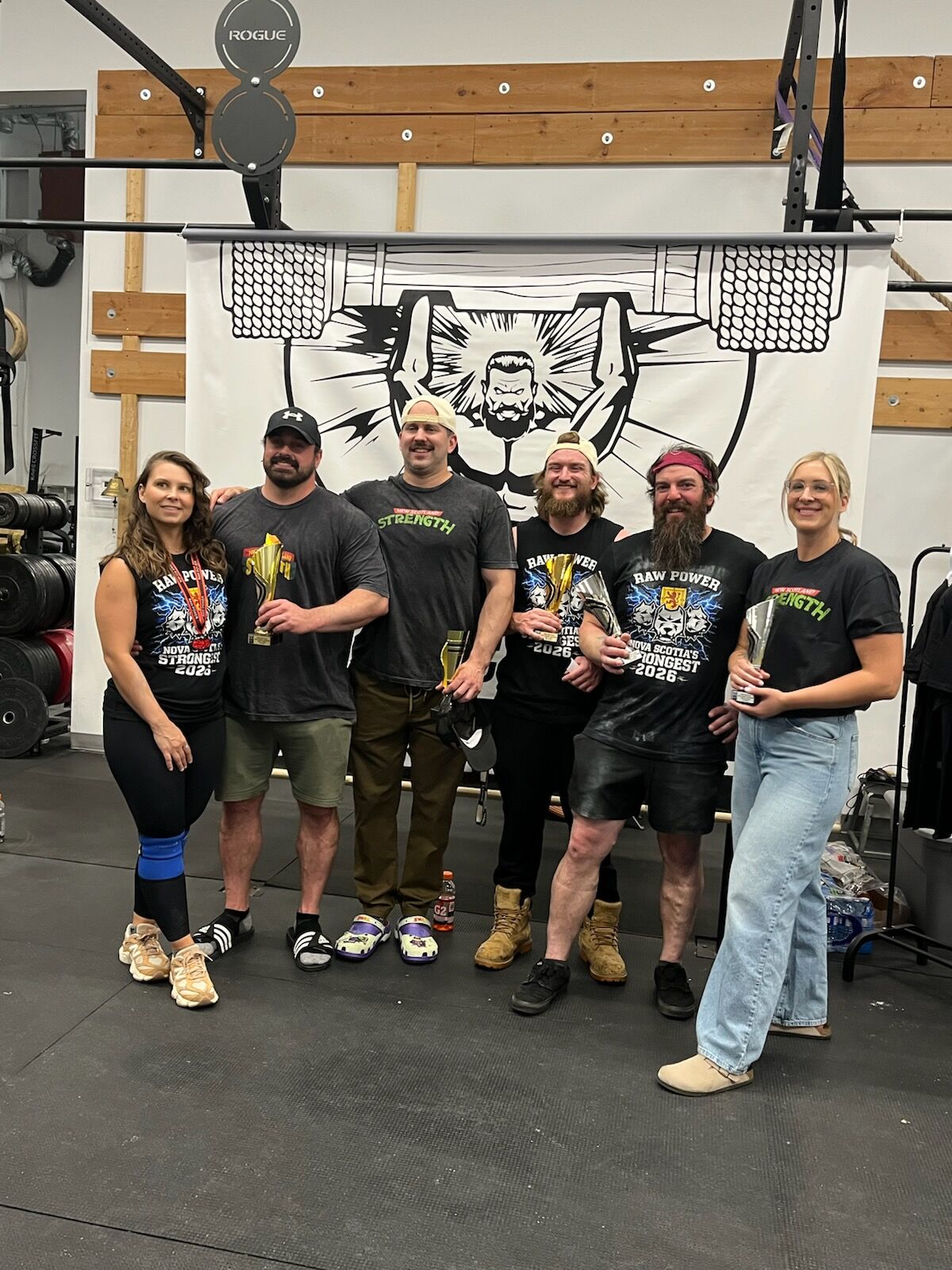 New Scotland Strength athletes with their trophies at Nova Scotia's Strongest 2026